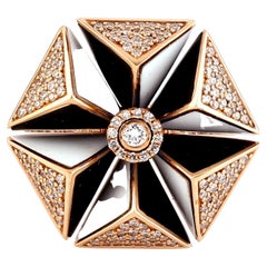 Ring aus 18 Karat Roségold mit edlem Stern und offenem Konzept aus schwarzer und weißer Keramik