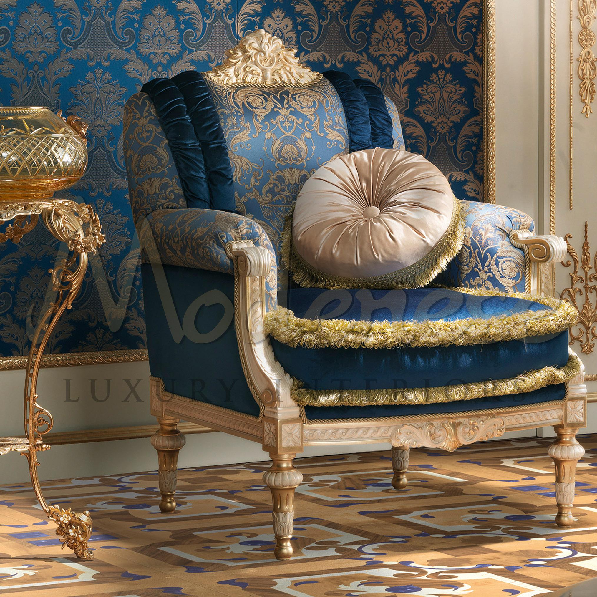 Complete a lavish living room set up with this sophisticated royal blue armchair. The carefully selected upholstery fabric adds a unique charm on the gold-painted solid wood of this sofa. The deep seated chair is upholstered with a mix of foam and