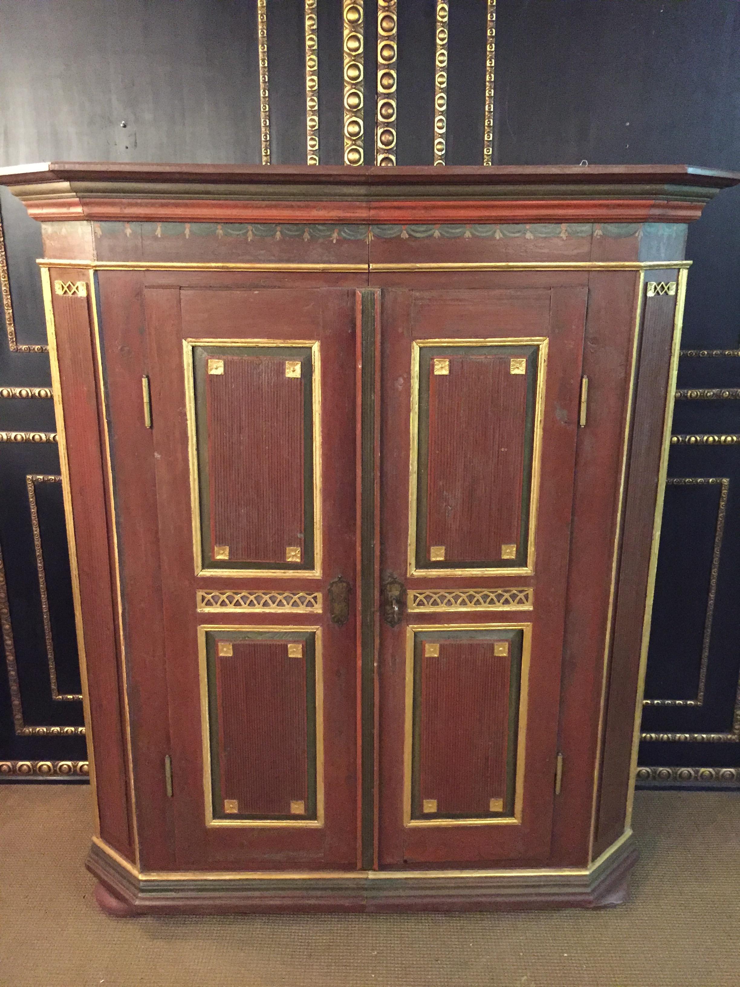 Extremely impressive noble building cabinet. Germany circa 1790 Beautiful historical gold leaf. Old snap closure with original key and wrought iron fittings.
The cabinet can be divided in half for transportation.