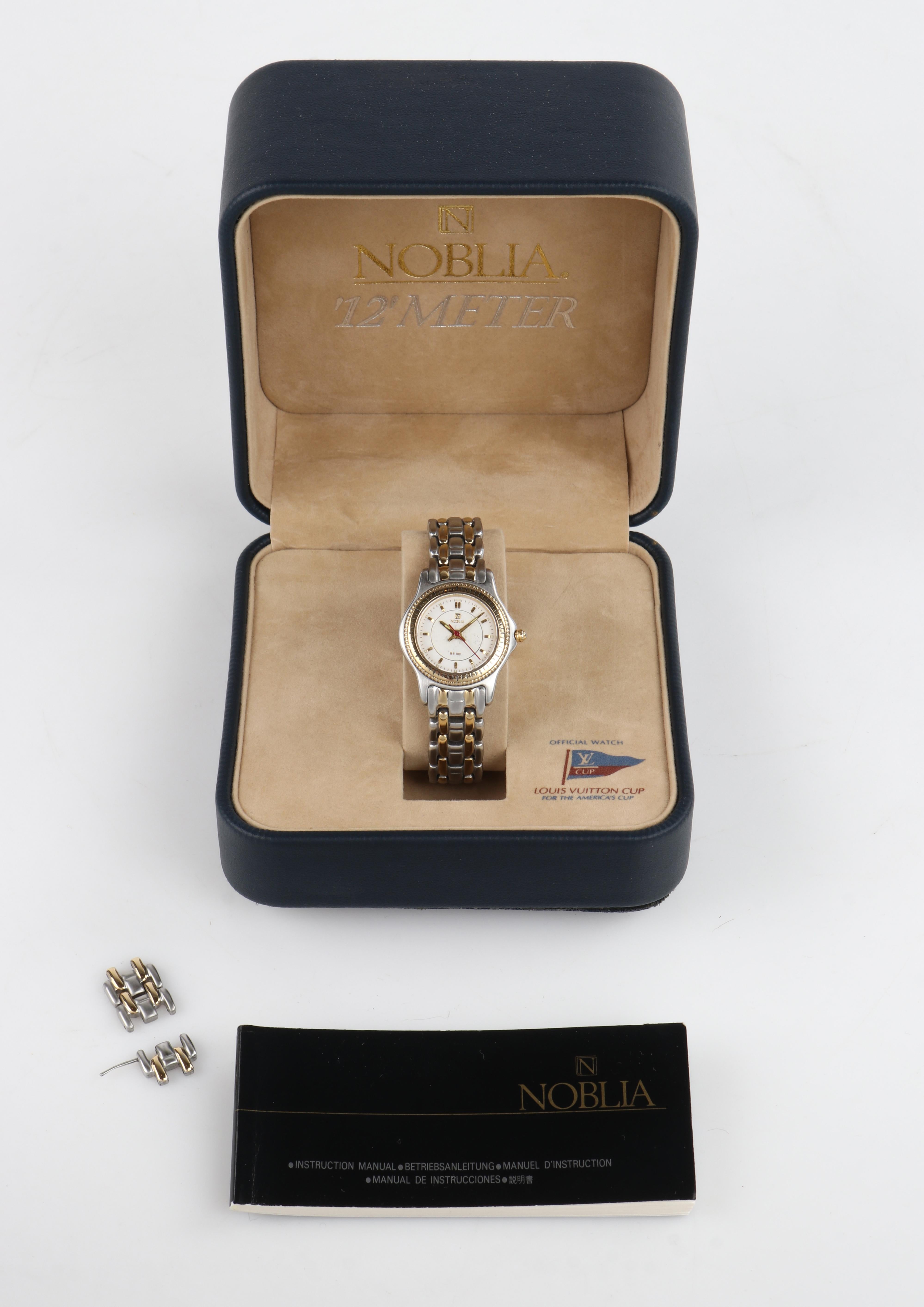 NOBLIA '12' METER Louis Vuitton Cup c.1995 Two-Tone Stainless Steel Wrist Watch

Brand / Manufacturer: Noblia
Collection: '12' Meter circa 1995
Style: Wrist watch
Color(s): Silver, Gold (metal) / White (dial) / Red (hand)
Lined: No
Marked Material: