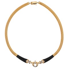 Collana trasformabile di Nobuko Ishikawa in oro 18 carati, platino, diamanti e onice