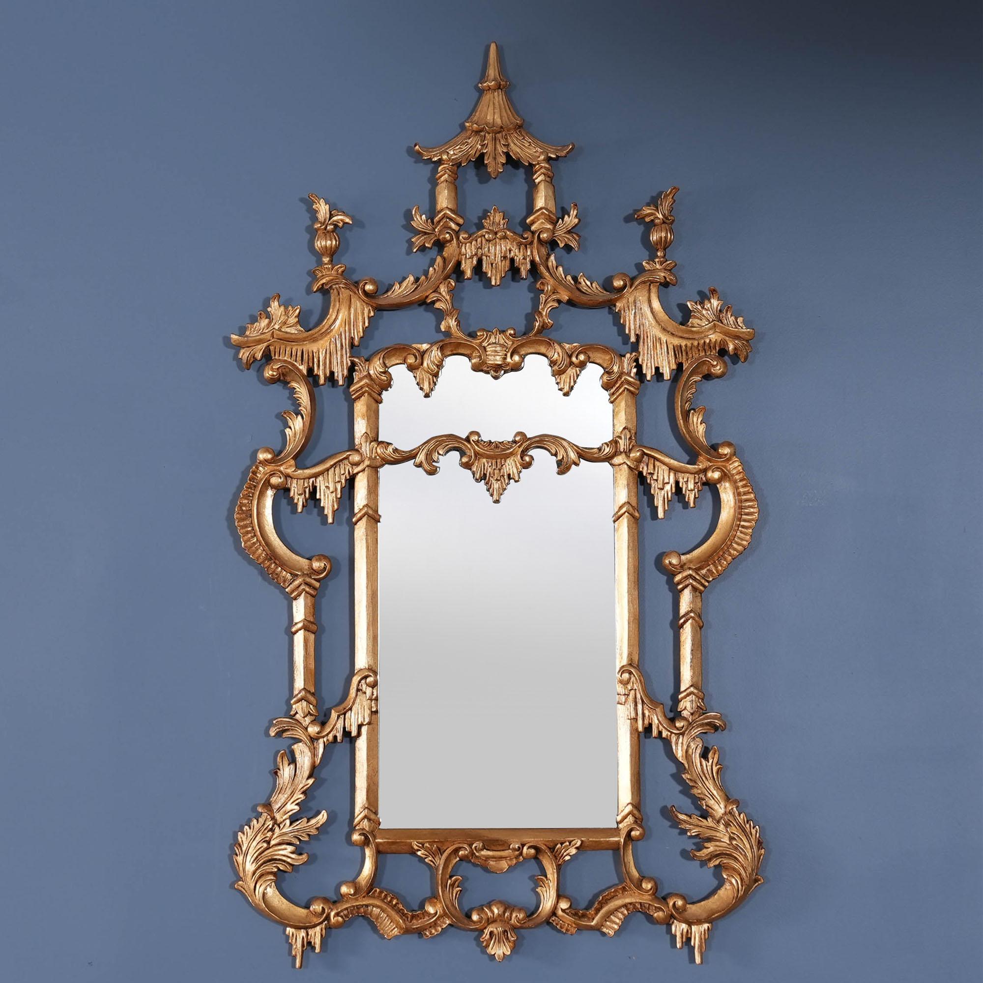 A Chinese Chippendale Gold Leaf Mirror from Niagara Furniture, the bevelled glass having been hand cut and fitted to the hand carved and hand pierced frame. A high quality solid wood mirror frame that will lend elegance to any interior.

Measures