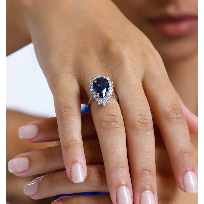 Women's 8.14ct Sapphire And Diamond Halo Ring For Sale