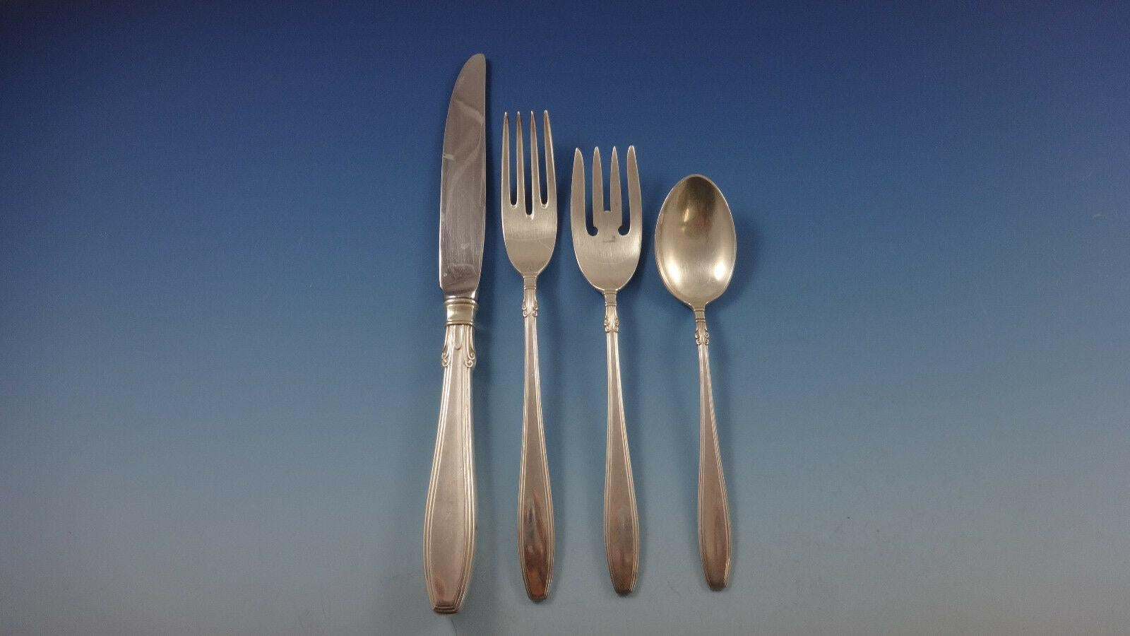 Nocturne by Gorham sterling silver flatware set, 38 pieces. This pattern has a great look! This set includes:

8 knives, 9