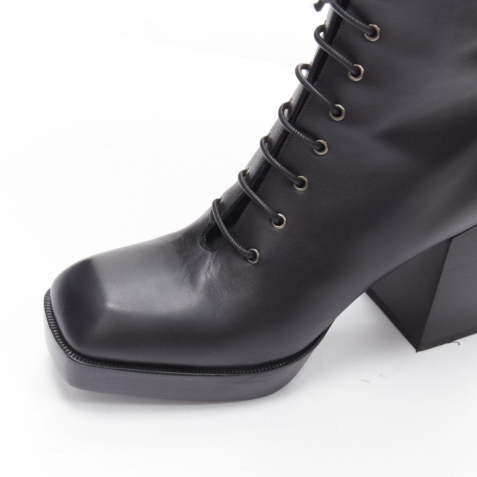 NODALETO black lace up square toe block heeled platform boots EU39 US9
Reference: AAWC/A00130
Brand: Nodaleto
Material: Leather
Color: Black
Pattern: Solid
Closure: Lace Up
Lining: Leather
Extra Details: Cutout logos at back of ankles.
Made in: