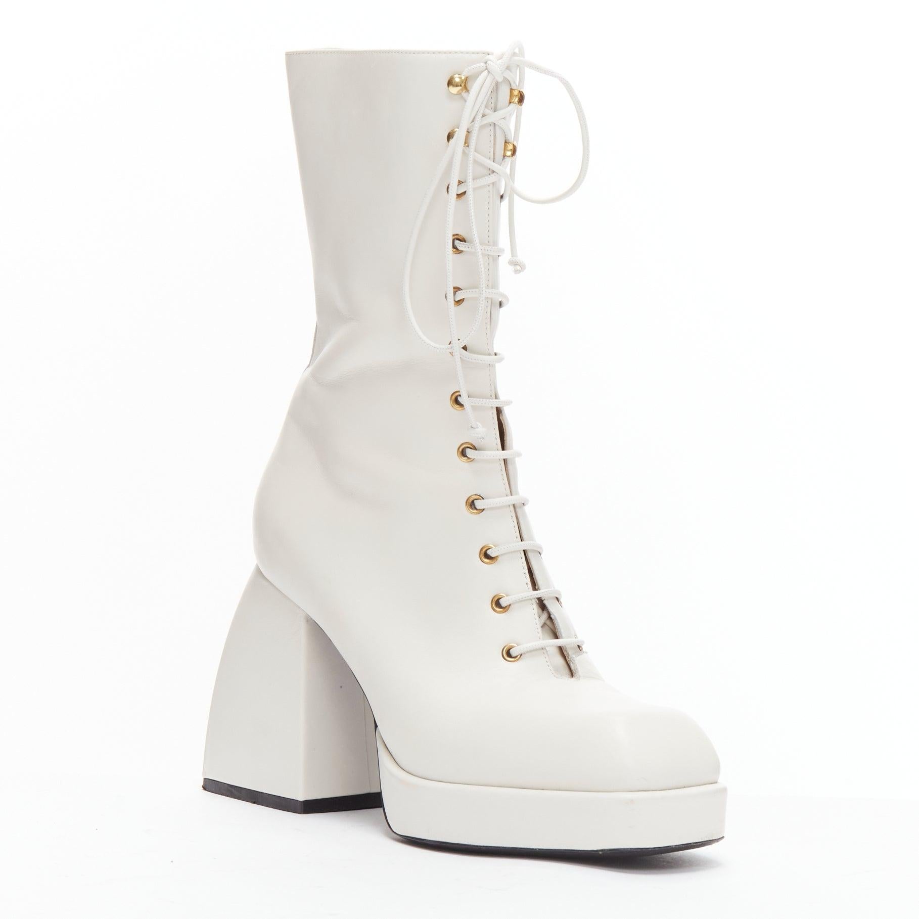 NODALETO Bulla Candy white leather chunky heels lace up boots EU38
Reference: BSHW/A00178
Brand: Nodaleto
Model: Bulla Candy
Material: Leather
Color: White
Pattern: Solid
Closure: Lace Up
Lining: Beige Leather
Extra Details: Chunky block heels.
Made