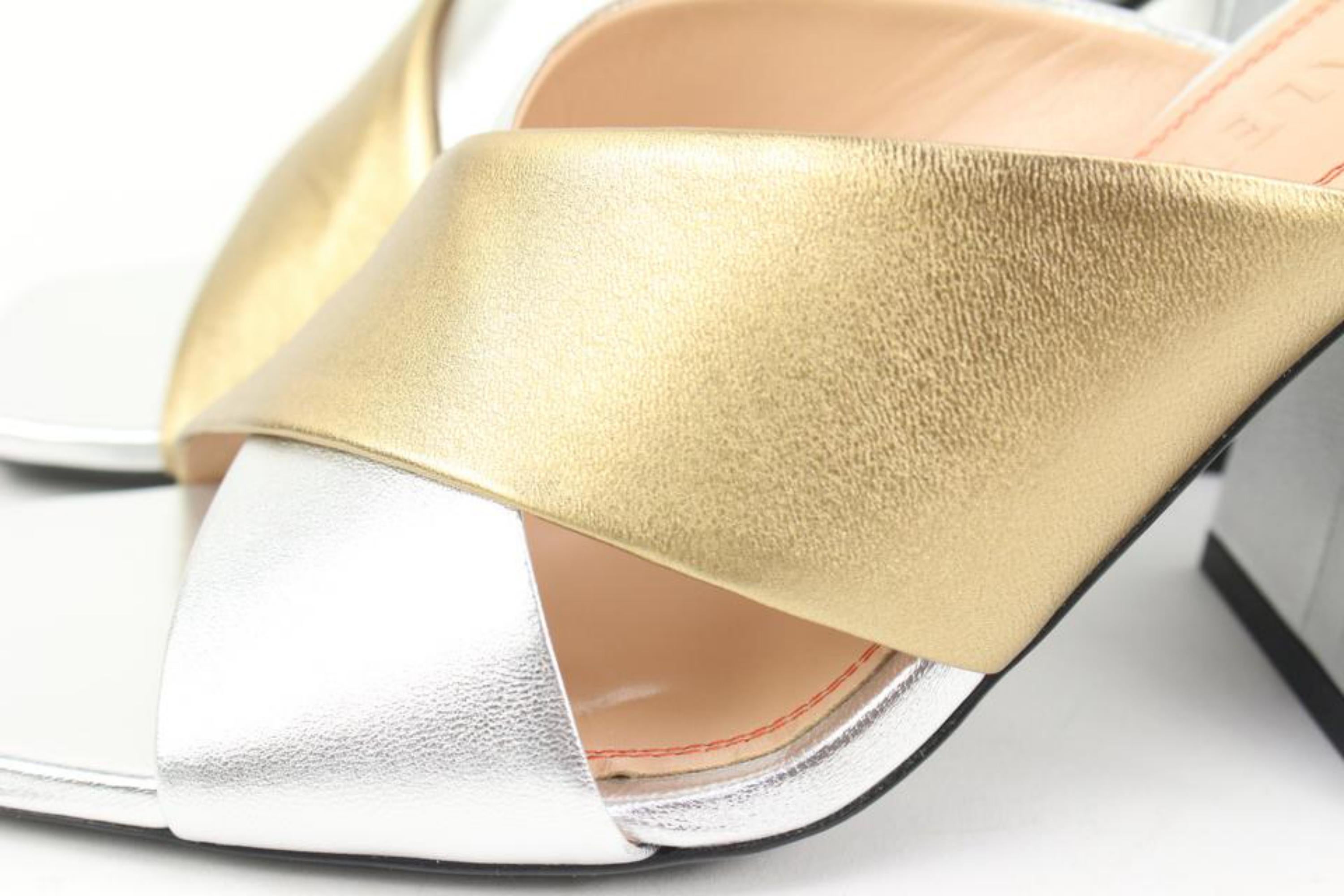 Nodaleto Size 36 Silver x Gold Leather Bulla Banks Block Heel Sandals  51n322s
Made In: Venice
Measurements: Length:  8.75