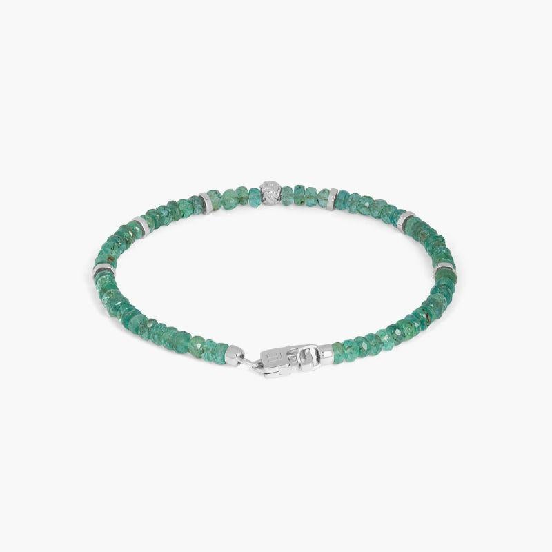 Nodo Bracelet with Emerald and Sterling Silver, Size S

Faceted emerald beads sit together with accents of rhodium-plated sterling silver discs and finished with our lobster clasp. A hand-crafted unisex piece, with each raw stone cut to attract the