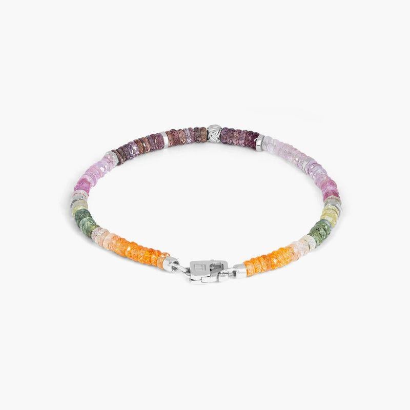 Nodo Bracelet with Multi-Colour Sapphire and Sterling Silver, Size L

Faceted multi-coloured sapphire stones sit together with accents of rhodium-plated sterling silver discs and finished with our lobster clasp. A hand-crafted unisex piece, with