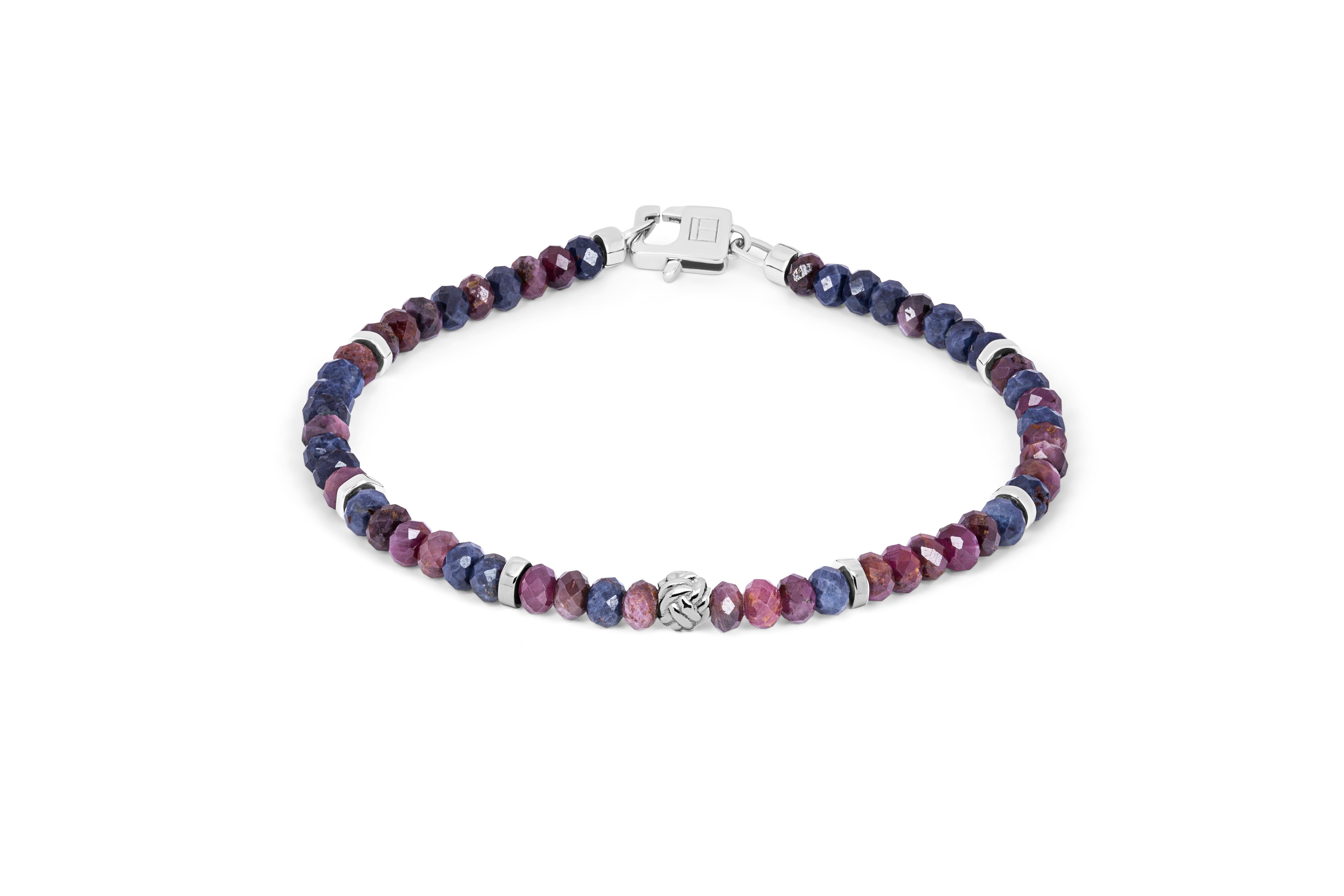 Nodo Bracelet with Red and Blue Sapphires and Sterling Silver, Size L

Faceted blue and red sapphire beads sit together with accents of rhodium-plated sterling silver discs and finished with our lobster clasp. A hand-crafted unisex piece, with each
