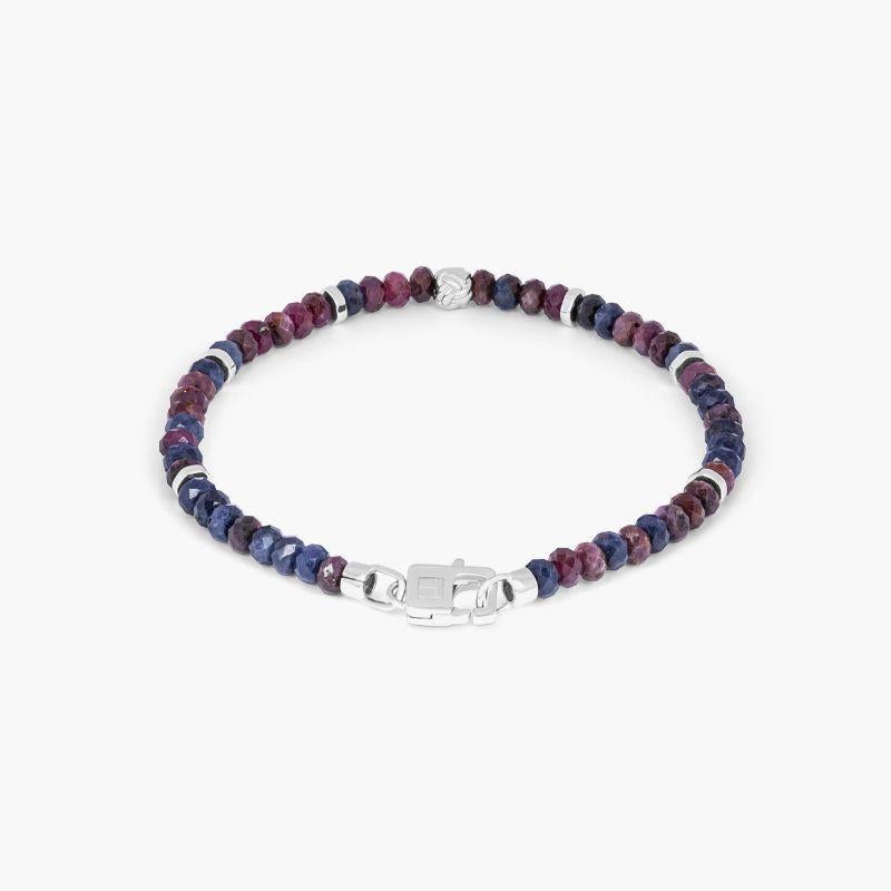 Nodo Bracelet with Red and Blue Sapphires and Sterling Silver, Size M

Faceted blue and red sapphire beads sit together with accents of rhodium-plated sterling silver discs and finished with our lobster clasp. A hand-crafted unisex piece, with each