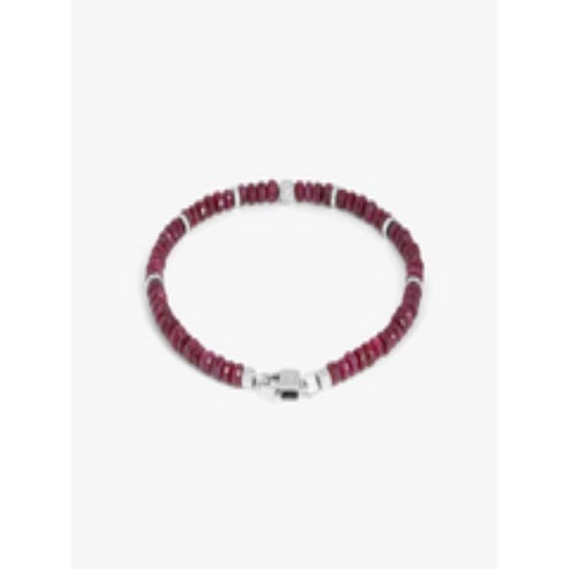Nodo bracelet with ruby and sterling silver, Size L

Faceted ruby beads sit together with accents of rhodium-plated sterling silver discs and finished with our lobster clasp. A hand-crafted unisex piece, with each raw stone cut to attract the