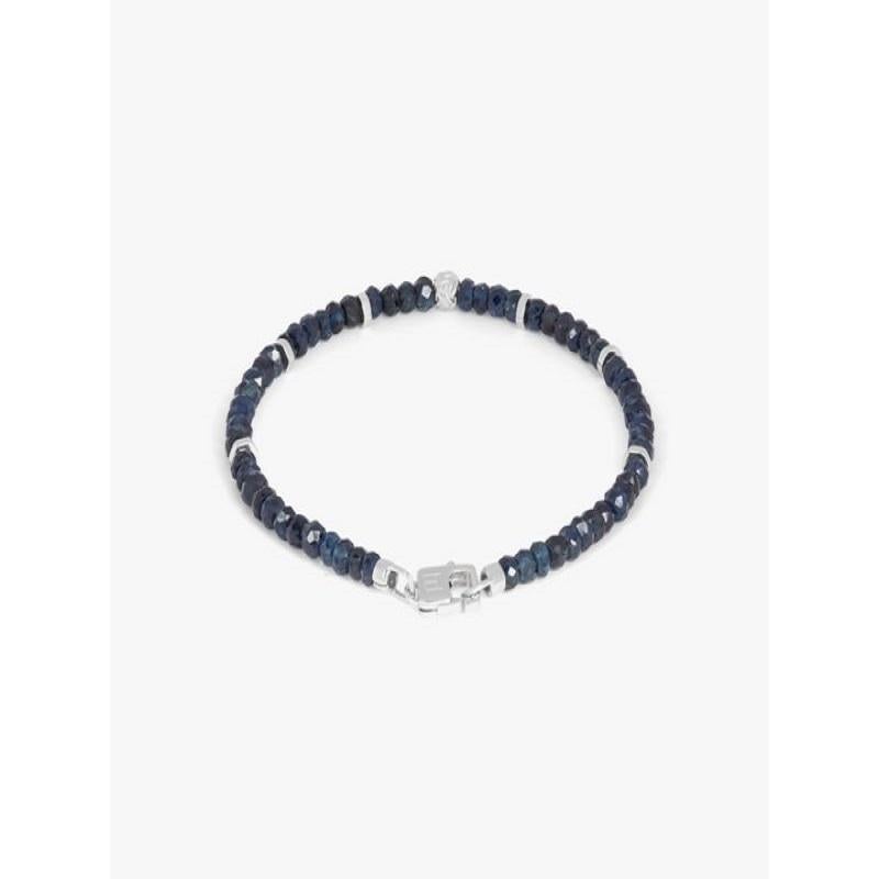 Nodo bracelet with sapphire and sterling silver, Size L

Faceted sapphire beads sit together with accents of rhodium-plated sterling silver discs and finished with our lobster clasp. A hand-crafted unisex piece, with each raw stone cut to attract