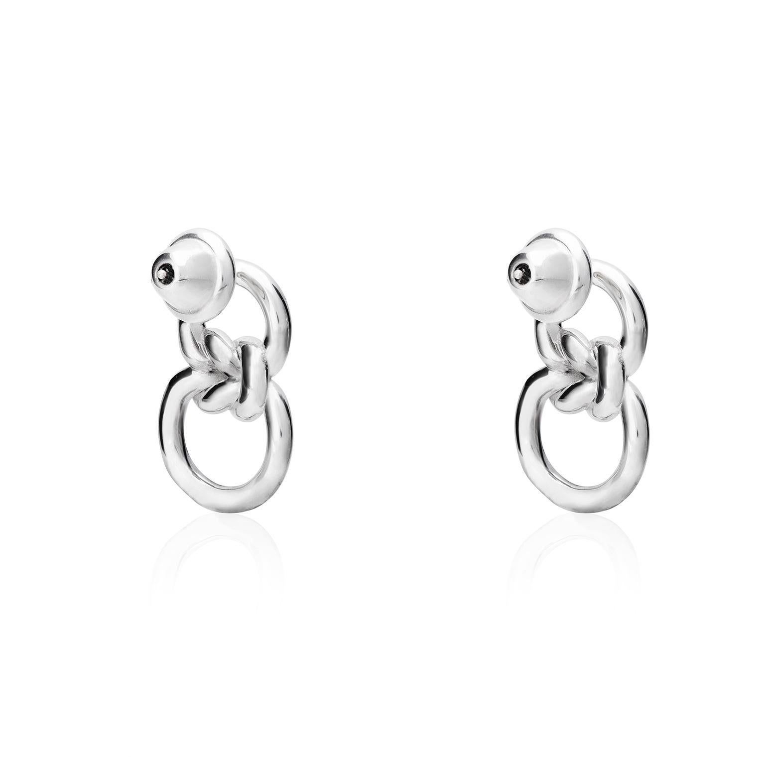 Knot-inspired earrings. Made in silver .925. 

To preserve the beauty of your TANE products, we recommend that you avoid any contact with oil or alcohol-based substances, cosmetics, perfumes or disinfectant.