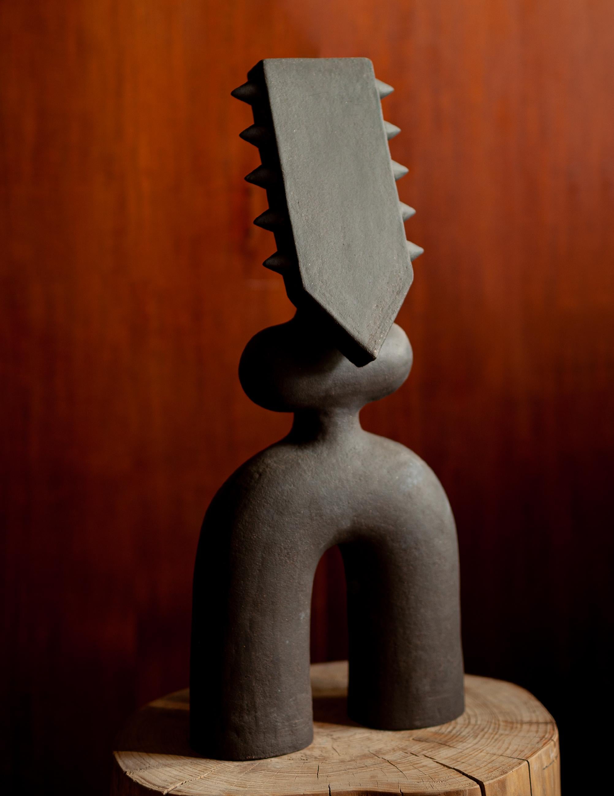 Edition 3 of 8

Noe Kuremoto — A Contemporary Keeper of Ancient Wisdom

Noe Kuremoto’s work exists at the intersection of mythology, memory, and modernity. A ceramic artist of singular vision, she sculpts entirely by hand, using only the simplest of