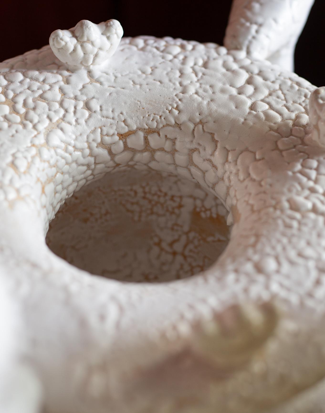 Noe Kuremoto — A Contemporary Keeper of Ancient Wisdom

Noe Kuremoto’s work exists at the intersection of mythology, memory, and modernity. A ceramic artist of singular vision, she sculpts entirely by hand, using only the simplest of tools—an