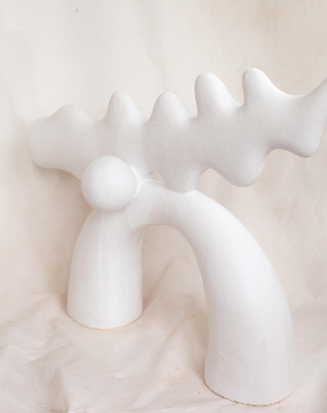 Noe Kuremoto — A Contemporary Keeper of Ancient Wisdom

Noe Kuremoto’s work exists at the intersection of mythology, memory, and modernity. A ceramic artist of singular vision, she sculpts entirely by hand, using only the simplest of tools—an