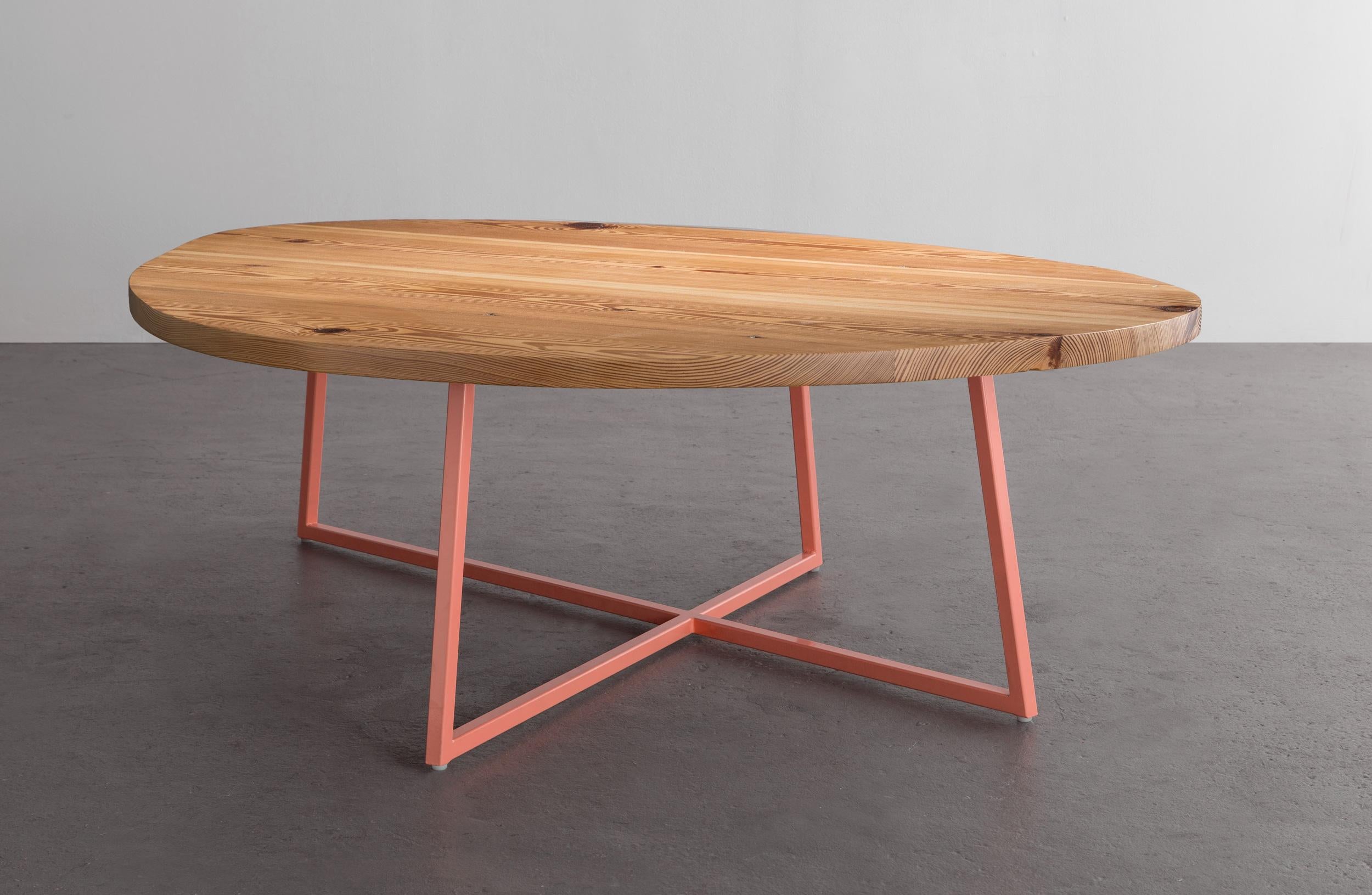 The Noguchoff coffee table is a casual and playful rendition of an iconic table through new line, surface, and color.

Shown in reclaimed heart pine and available in ash, cherry, maple, walnut, or white oak. 
Frame shown in coral powder coat and