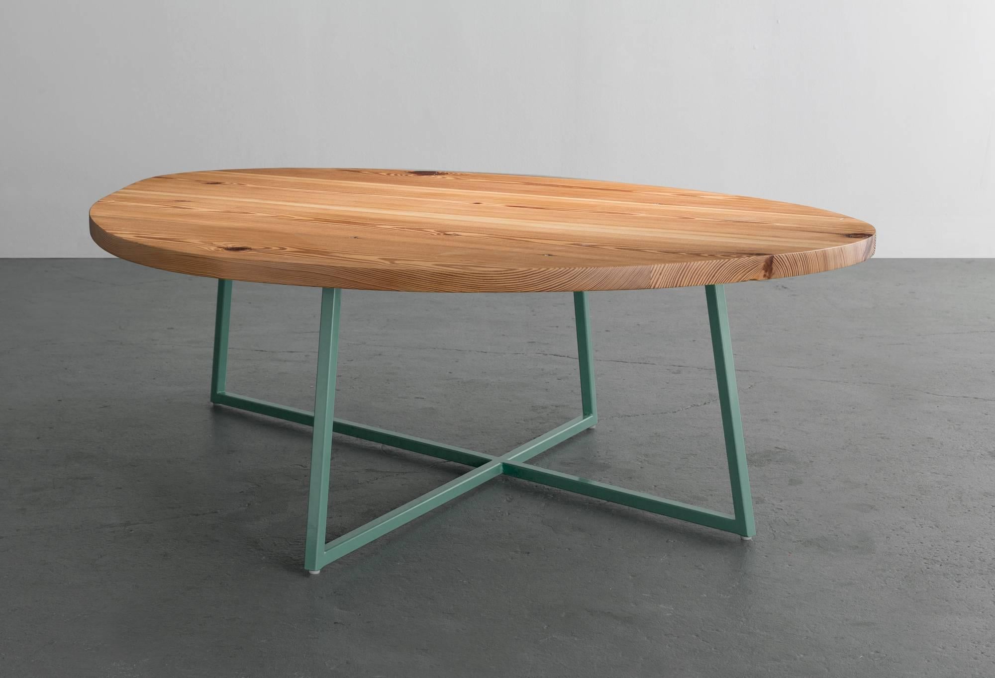 The Noguchoff coffee table is a casual and playful rendition of an iconic table through new line, surface, and color.

Shown in reclaimed heart pine and available in ash, maple, walnut, or white oak. 
Frame shown in green powder coat and also