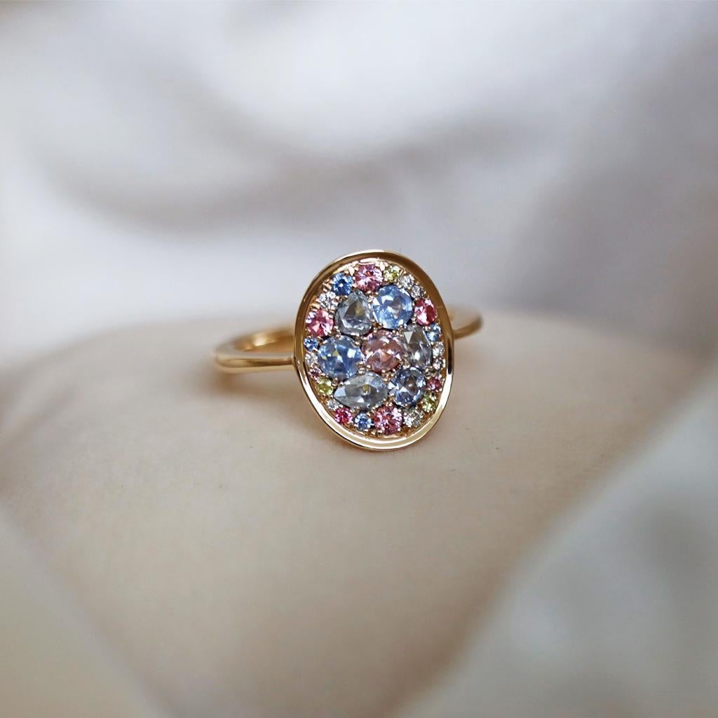 This Bright Pastel Colour Ring, is a One of a kind ‘Starstruck’ ring handmade in Belgium by Jewelry designer Joke Quick.
This 18K Yellow gold ring is Handmade the traditional way, no casting or printing is involved.

This ring is a unique piece and