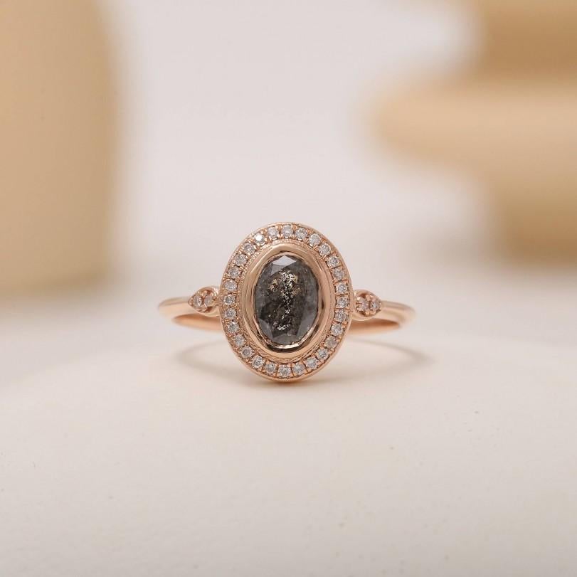 Product Details :

• Made to Order

• Gold Kt: 14kt

• Available Gold Colors: Rose Gold, Yellow Gold, White Gold

• 0.20ct Natural Diamond

• 1.11ct Center Oval Salt And Pepper Diamond

• Diamond Color-Clarity: F-G Color VS/SI Clarity

• Comes with