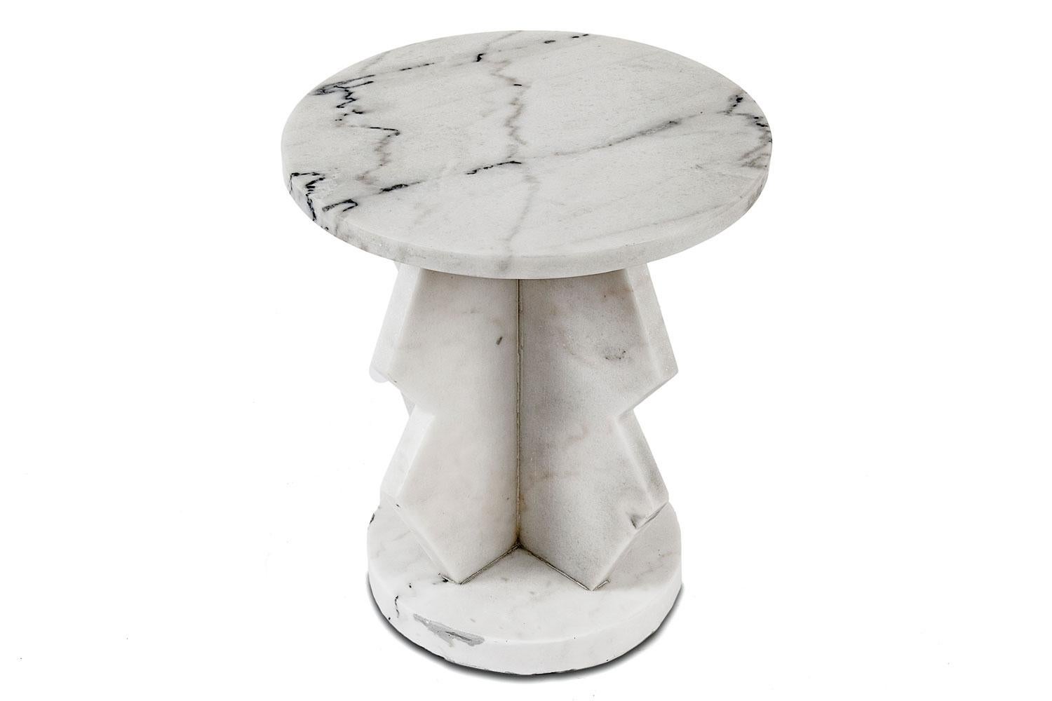 Belasco white marble side table, Noir*

* As a natural material, shipped stones may vary in color, pattern, texture, or veining.

As the lead designer, Swiss-born Georg Baehler creates every item for Noir the old-fashioned way: with a pencil and