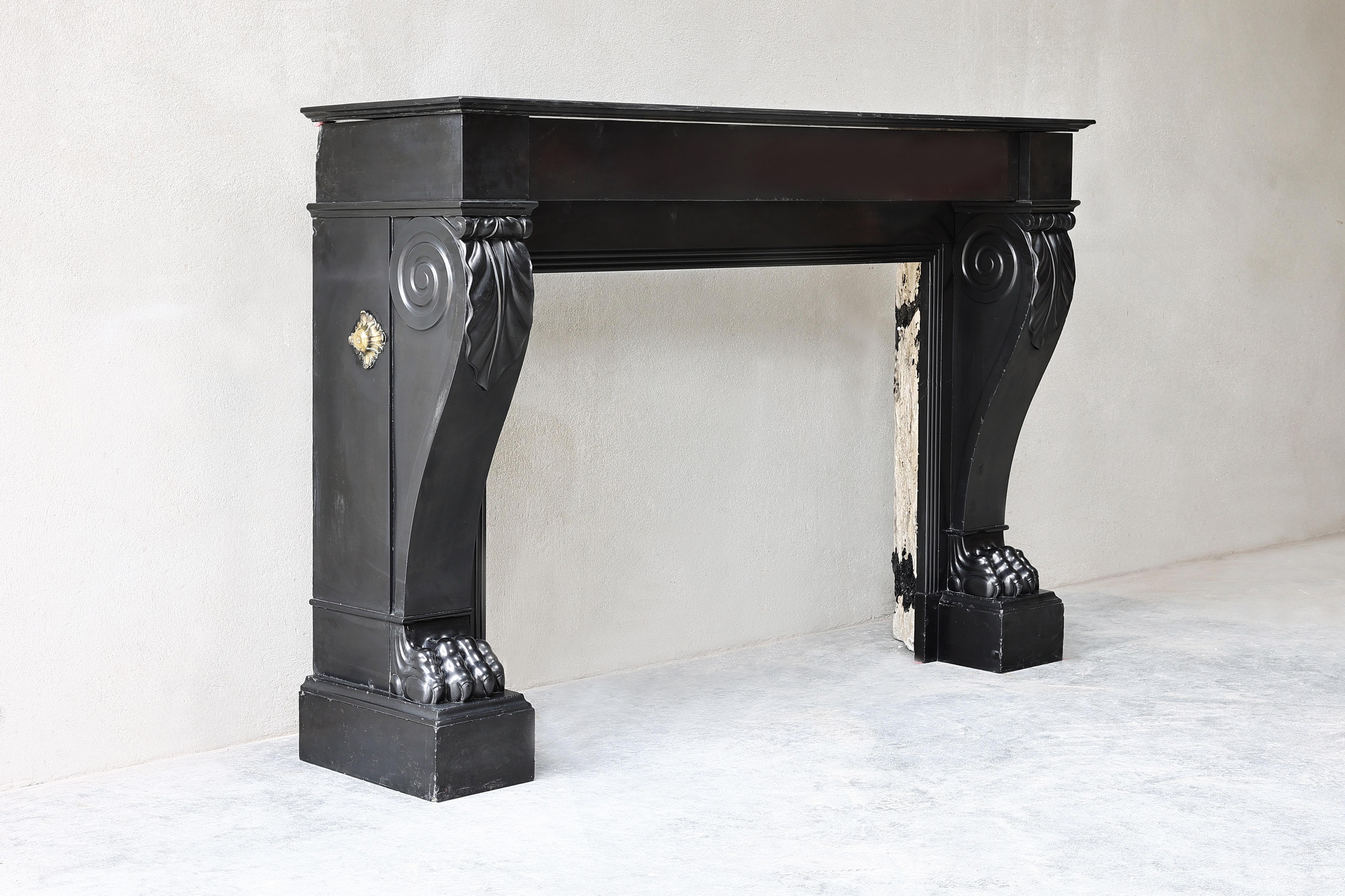 Beautiful antique fireplace of Noir de Mazy marble! Noir de Mazy marble is an exclusive black Belgian marble that comes from the quarries in Mazy - Belgium. The black marble is also named 
