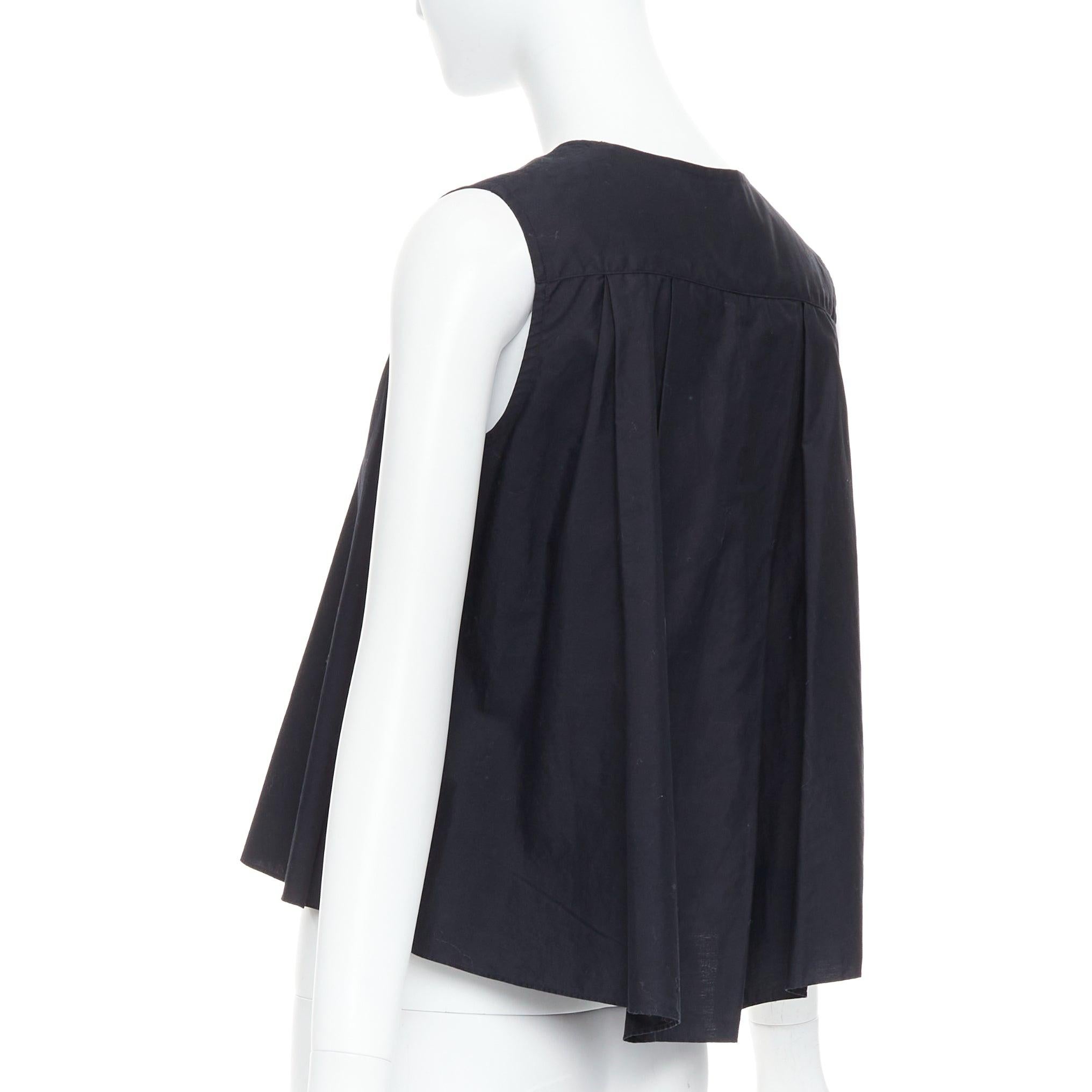 NOIR KEI NINOMIYA 2016 top acampanado de algodón negro con botones ocultos delante S
Referencia: AEHI/A00001
Marca: Noir Kei Ninomiya
Colección: 2016
Material: Algodón
Color: Negro
Patrón: Sólido
Cierre: Botón
Detalles adicionales: Corte