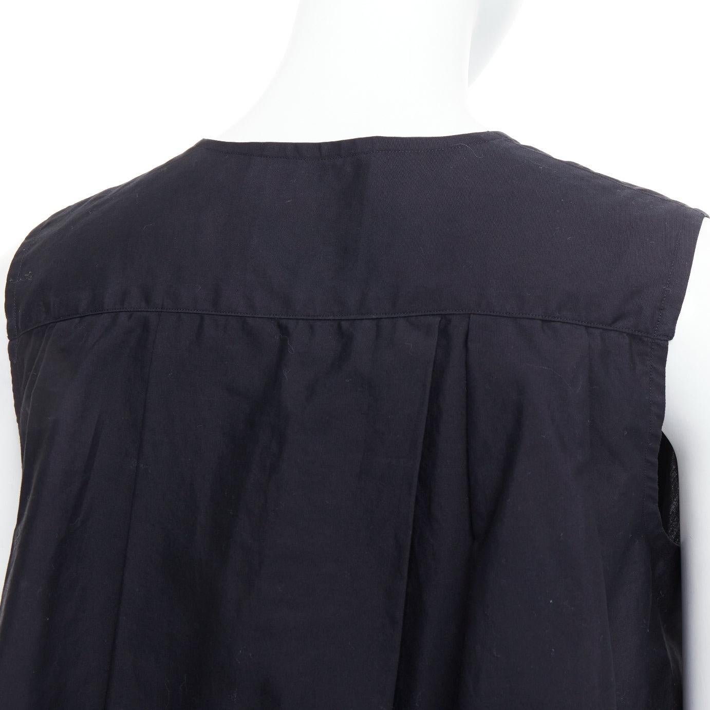 NOIR KEI NINOMIYA 2016 top acampanado de algodón negro con botones ocultos delante S en venta 2