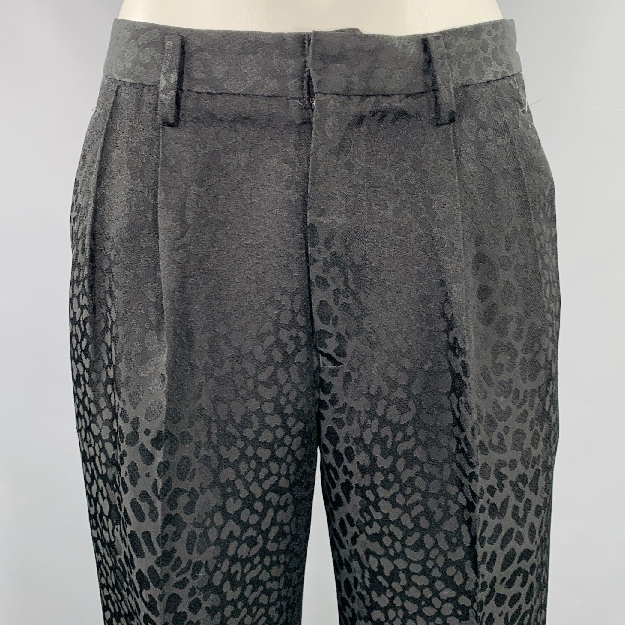 NOIR KEI NINOMIYA dress pants
in a black triacetate blend fabric featuring a leopard patterned jacquard, pleated style, and zip fly closure. Made in Japan.Excellent Pre-Owned Condition. 

Marked:   XS 

Measurements: 
  Waist: 28 inches Rise: 9.5