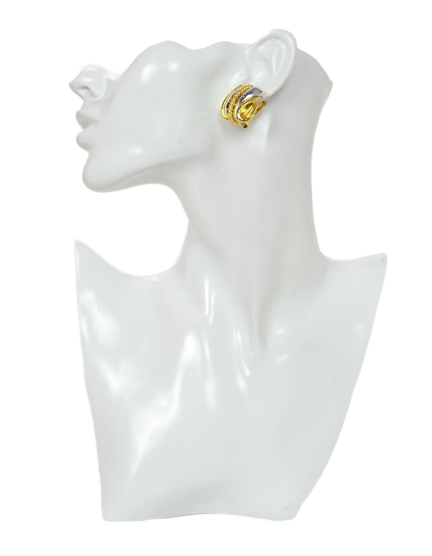 Nolan Miller Gold/Silver Metal Clip-On Earrings

Color: Gold, silver
Materials:  Metal
Hallmarks:  On back- 
