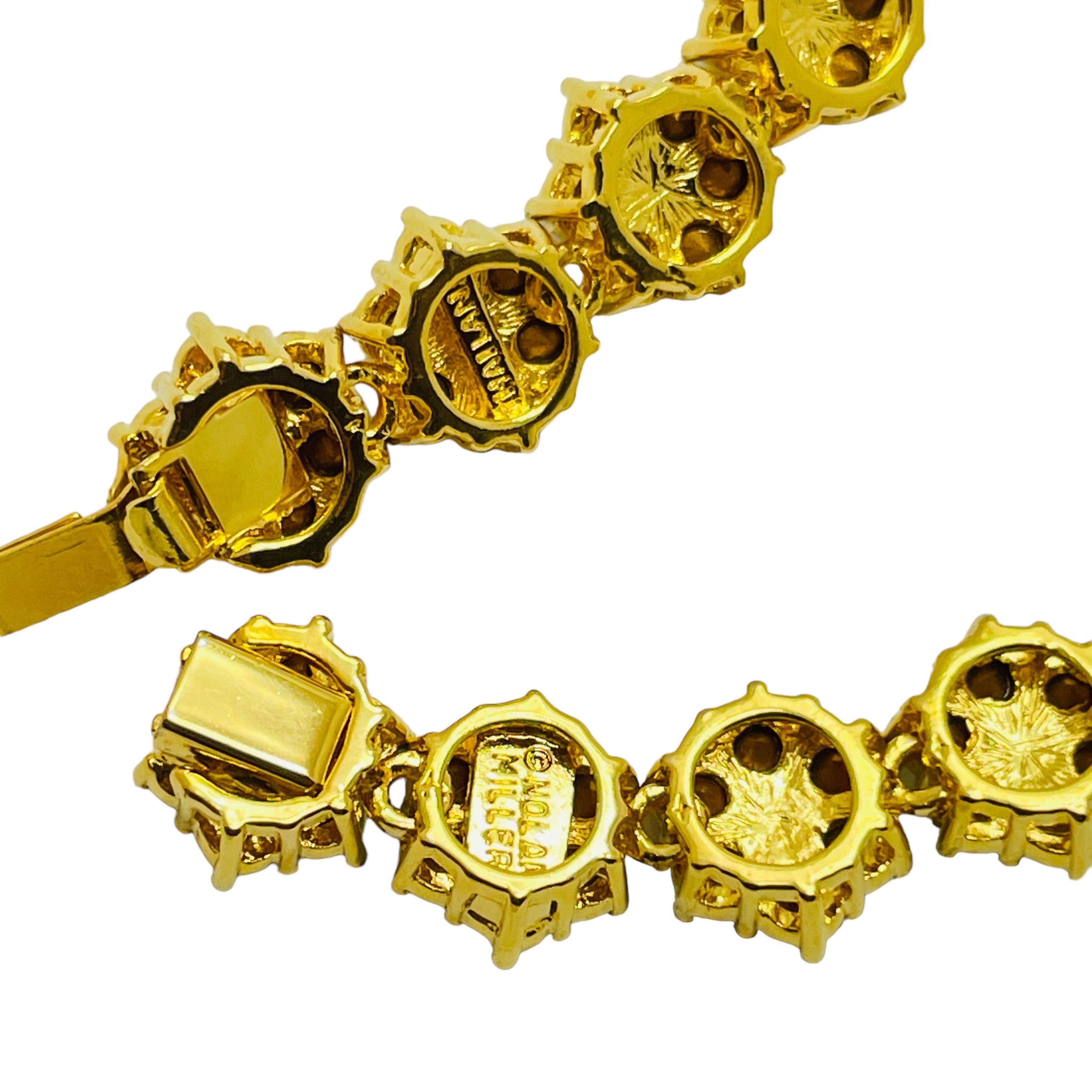 Bracciale firmato Nolan Miller con fiori di cristallo placcati in oro In condizioni buone in vendita a Palos Hills, IL