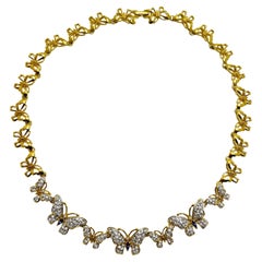 Collana firmata Nolan Miller con cristalli di zaffiro placcati oro e farfalla