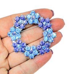 NOLAN MILLER signed vintage silver tone blue purple flowers designer brooch