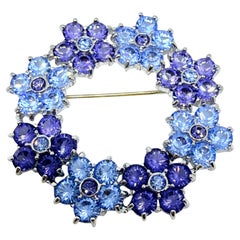 NOLAN MILLER signed vintage silver tone blue purple flowers designer brooch