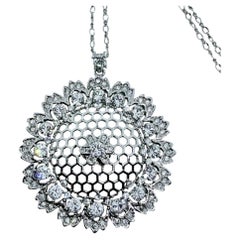 Collier à chaîne avec pendentif en strass vintage de couleur argentée, signé NOLAN MILLER
