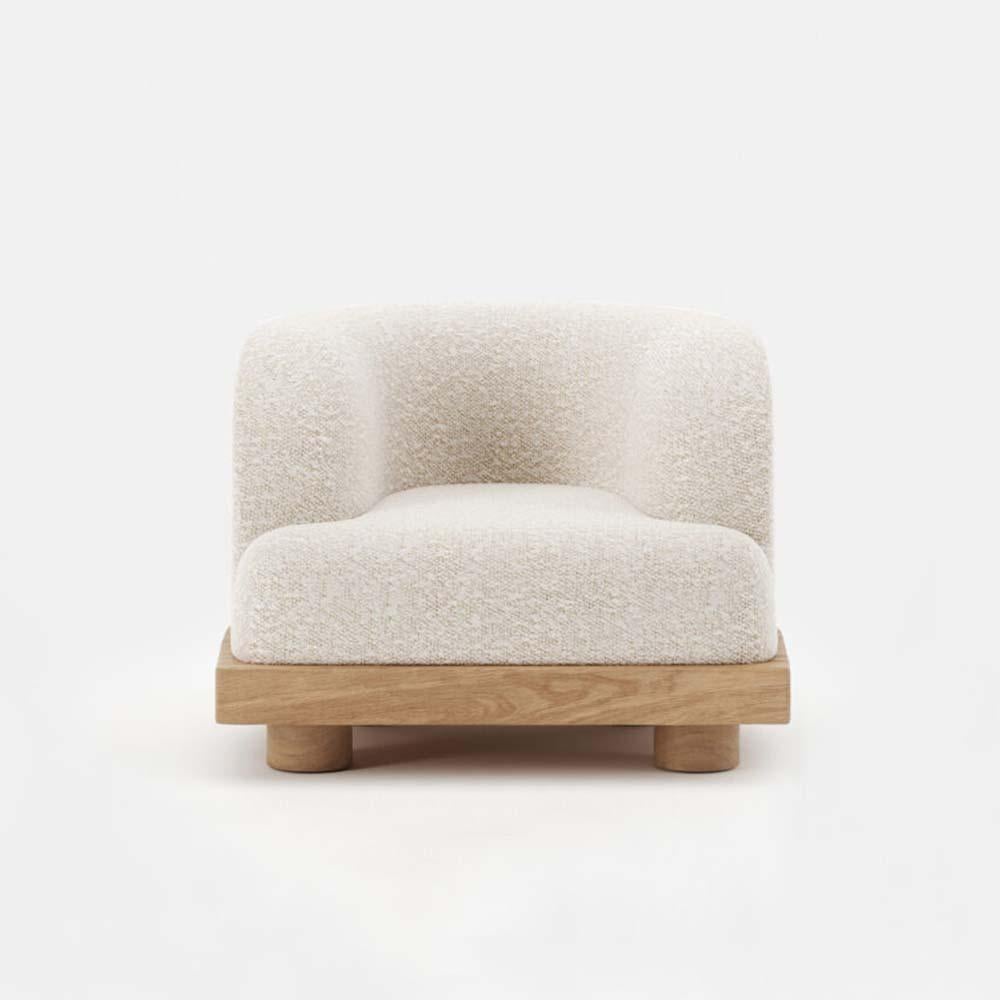 Designer : Emmanuelle Simon
StudioTwenty Seven

This comfortable armchair reminds the Art Deco influence of its designer Emmanuelle Simon with its round and angular curves. The comfortable fabric allied to the solid clear oak wood brings a sense of
