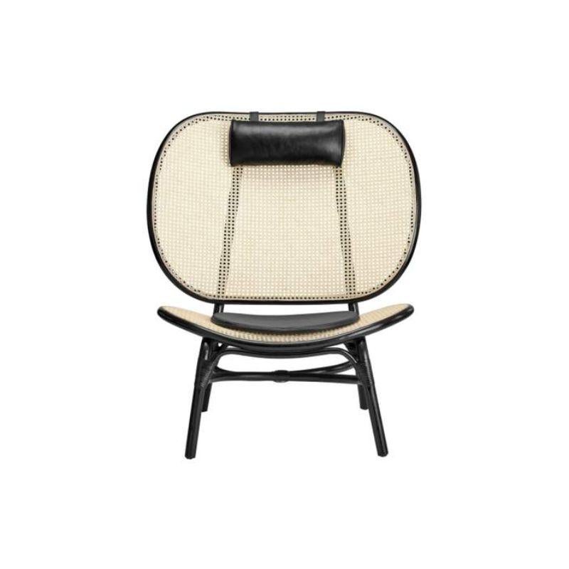 Nomad chair is a Nordic interpretation of the traditional Moroccan wicker chair. The name is a contradiction between “Nordic” and “Moroccan”, to the characteristic “Nomad”. The large seat and back are made of two molded bamboo frames with inlaid