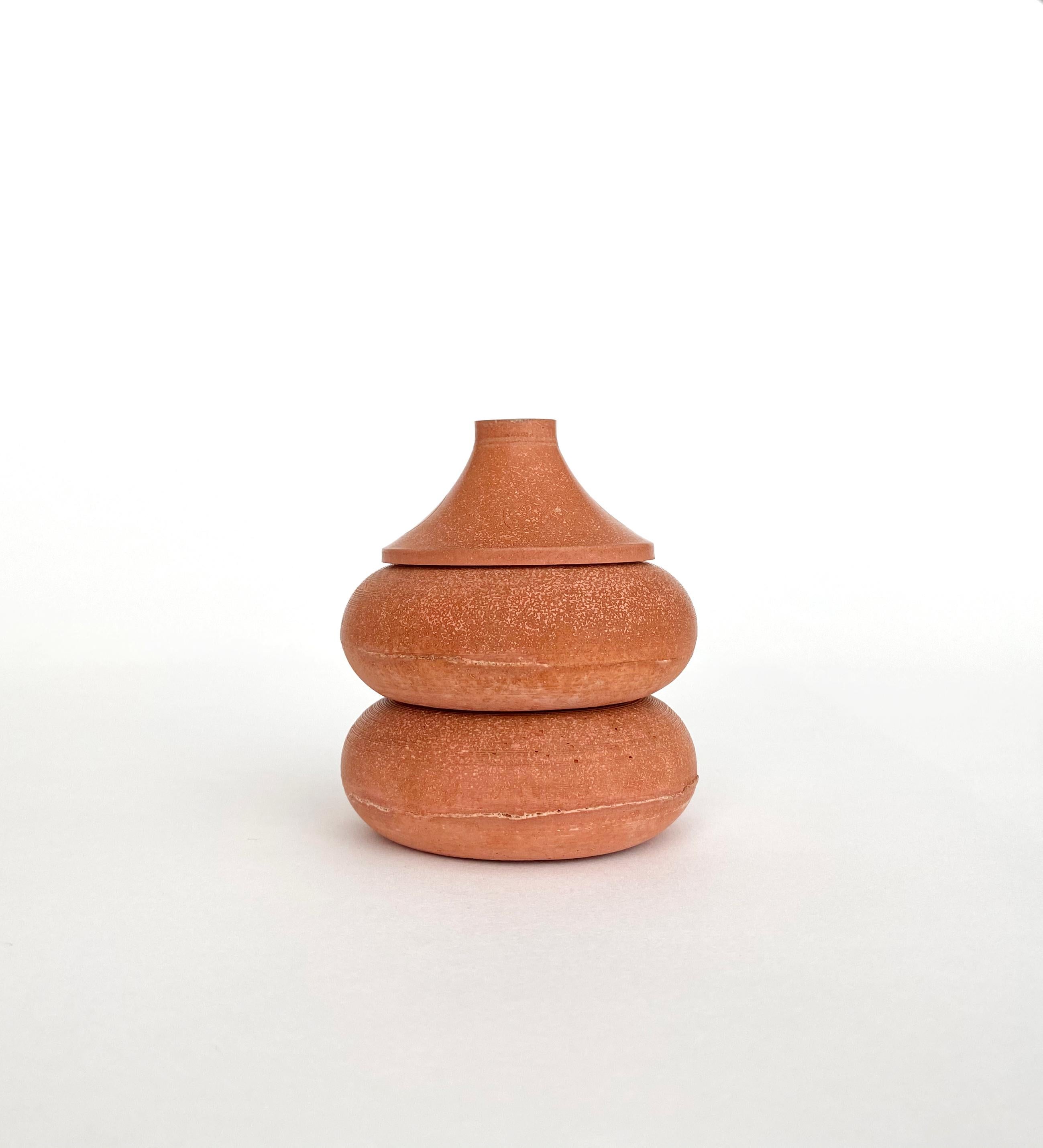 Nomad jar pebble tower by Gilles & Cecilie
Unique
Dimensions: H 8 x W 6 cm
Material: terracotta with iron

Gilles and Cecilie Studio created the Nomad Jar Family to explore drawing in three dimensions. The series of objects that can stand alone