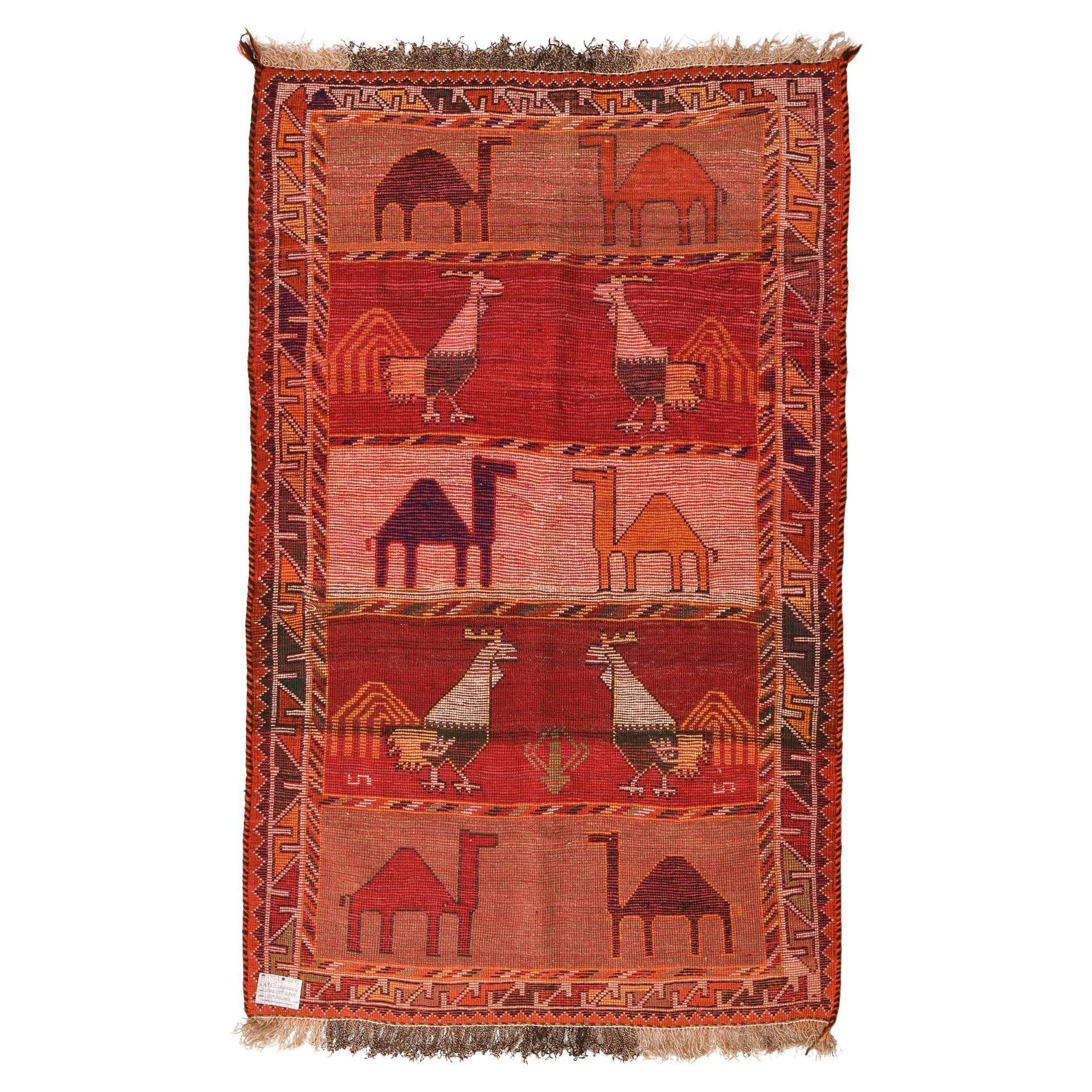 nr. 496 - From my Private Collection ----------------------
Nomadic vintage rug with camels and roosters.  Ideal for a country house, on the floor or hanging, but also in the city, as an unusual provocation: a work of modern art.