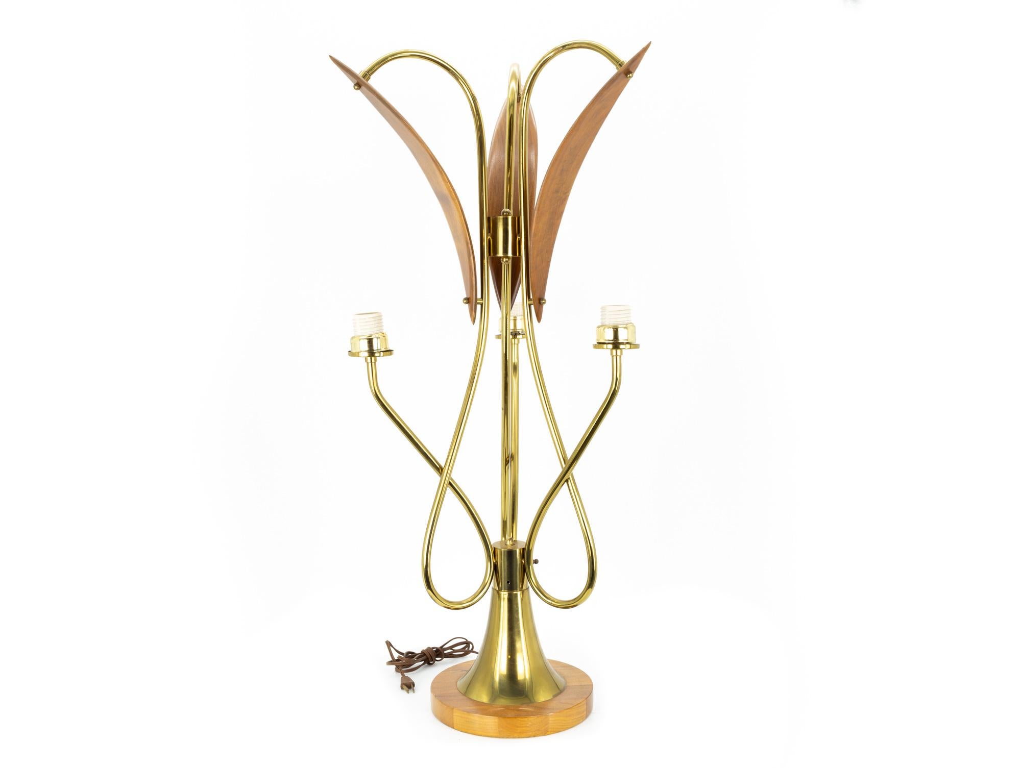 Nomina Organica Mid Century Brass Walnut Lamps - Pair

These lamps measure: 15.5 wide x 15.5 deep x 35.5 inches high

These lamps are in Excellent Vintage Condition

We take our photos in a controlled lighting studio to show as much detail as