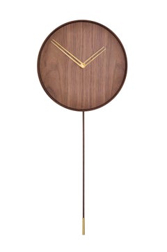 Nomon Swing  Wall Clock  By Andres Martinez