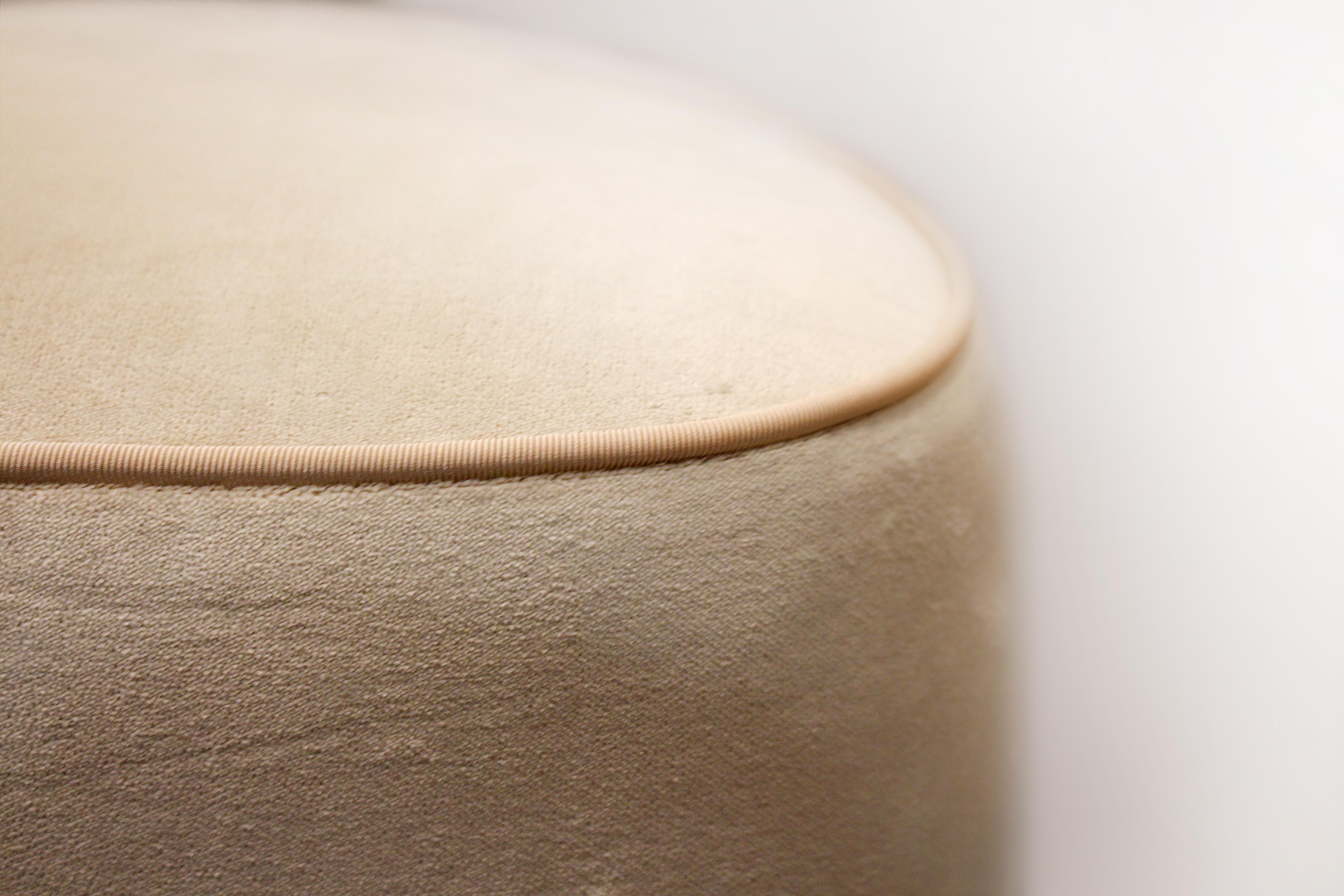 
Its jewelry box and softness shapes allure feminity to the design.
 Accompanied by a pouf/ottoman upholstered in velvet and silk trimming.
* Finish in natural walnut and upholstered in beige velvet