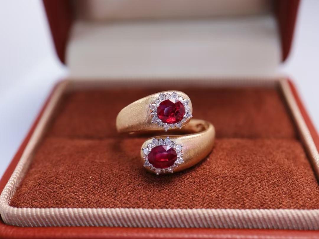 Non Heated Pigeon Blood Ruby Ring Yellow Gold Heavily Inlaid Buccellati Style

Main stone - 1.18 CT
Diamonds - 0.224 CT 
Total Weight - 3.16 GM

Pristine Ruby: Features two non-heated rubies with vivid red color and high transparency.
Luxurious