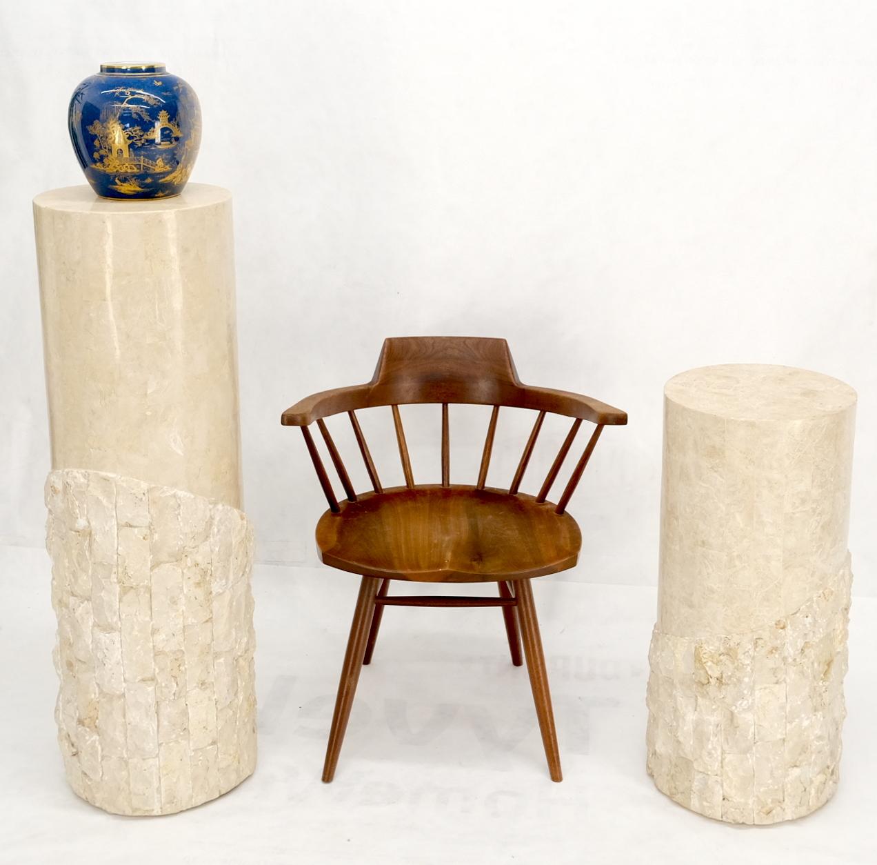 Pair of decorative mid century modern decor tessellated stone round pedestals. The short one is 29