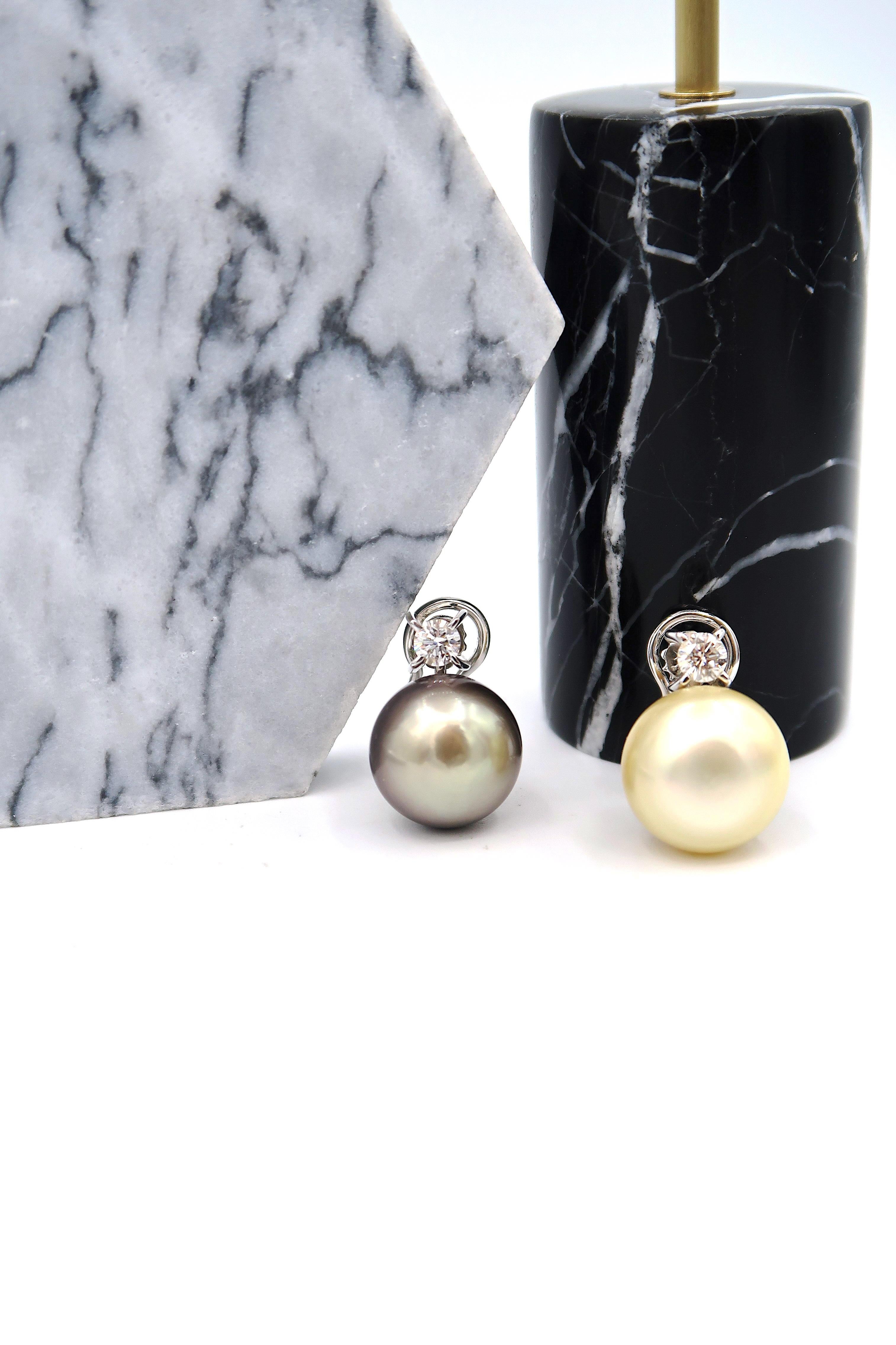 Non-pierced Mismatched Simple Diamond Light Gold South Sea Tahitian Pearl Clip Earrings

Metal: 18K White Gold, 5.43 g
Diamond: 0.50 ct
South Sea Pearl: 14.61 mm
Tahitian Pearl: 13.91 mm