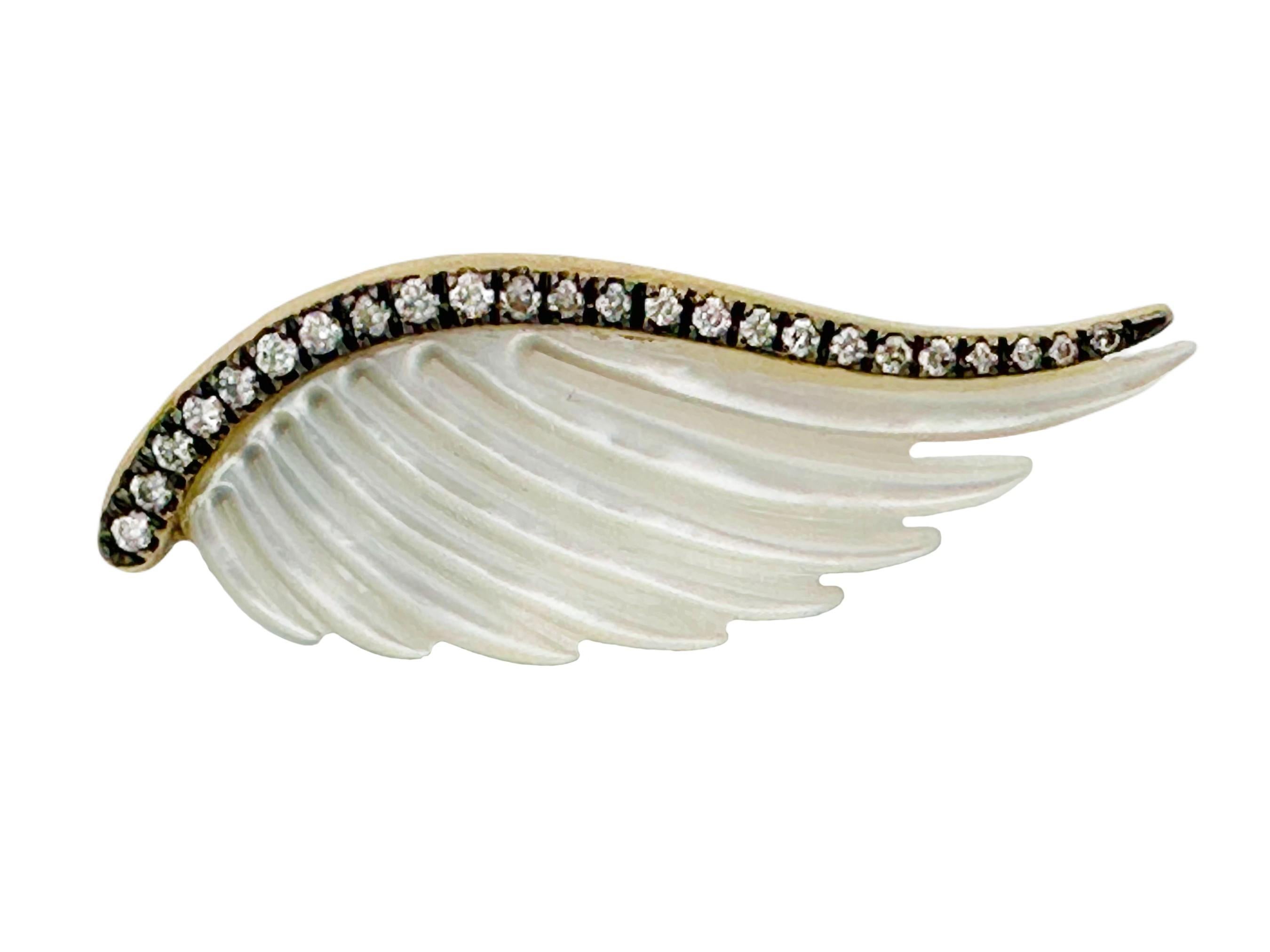 Gorgeous, dramatic and ethereal. These Noor Fares angel wing ear climbers are show-stoppers! Composed of 18k gold, lustrous carved mother-of-pearl, and 0.52cttw of diamonds in a blackened setting, these earrings are red carpet-worthy. They'd be