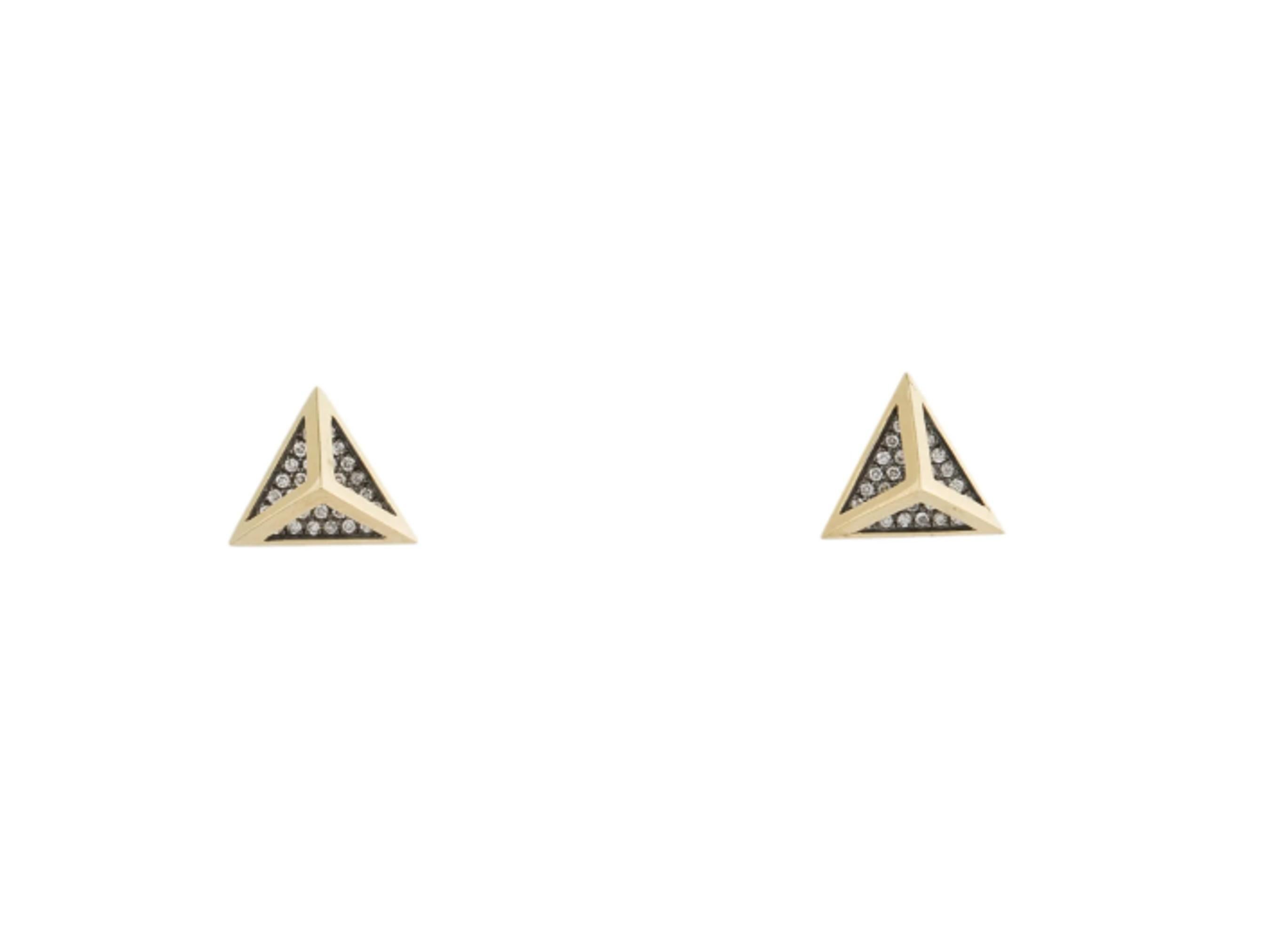 Dramatic yellow gold, blackened gold and diamond earrings from Noor Fares' Geometry 101 collection. The earrings' dimensional shape create an edgy look that stands out far from the typical diamond stud earring. The earrings are comprised of an 18k