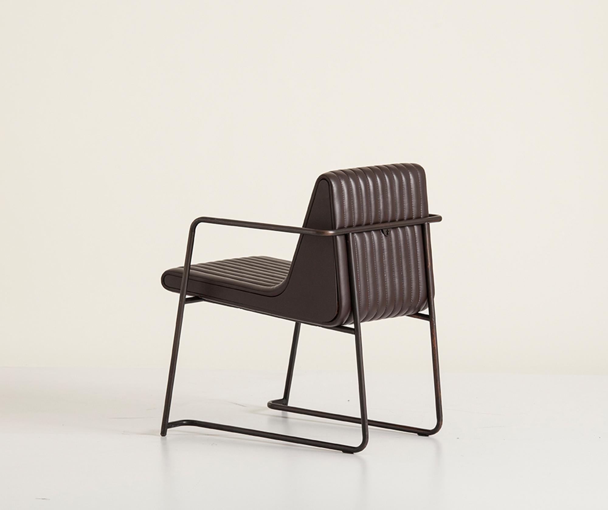 Originally designed for Nopa Restaurant, Nopa series combines comfort with a modern approach. Nopa Chair has a bold presence with its characteristic form and upholstery. The leather upholstered seat is nested in a tubular metal frame creating a
