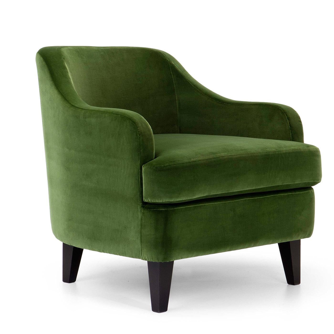 Modern functionality and classic elegance define this superb armchair whose contoured silhouette features gently rounded edges, outlining the large seat, medium backrest, and sloping armrests. Set on black solid wood legs, a sophisticated green